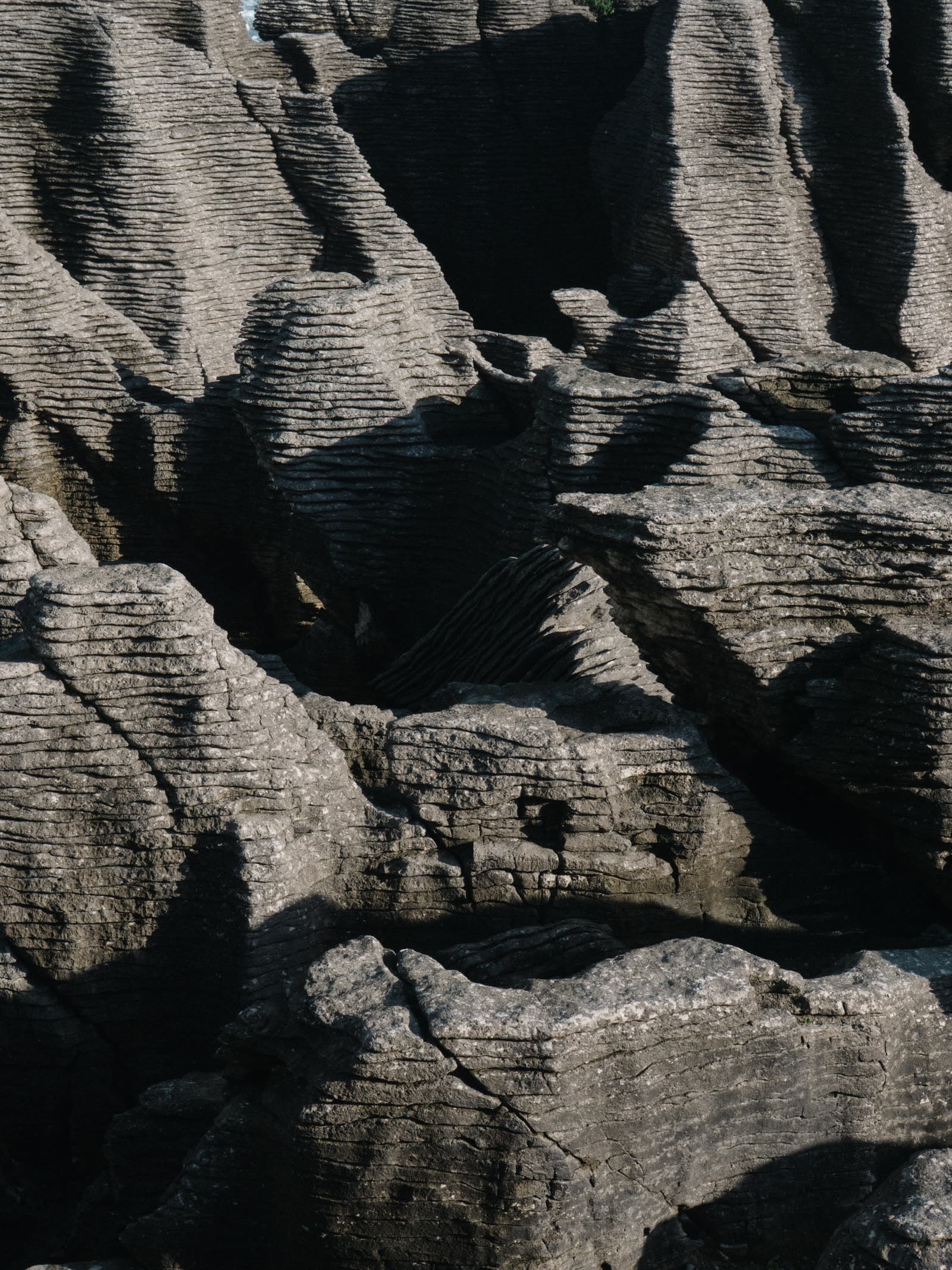 Layered stone formations shaped by water