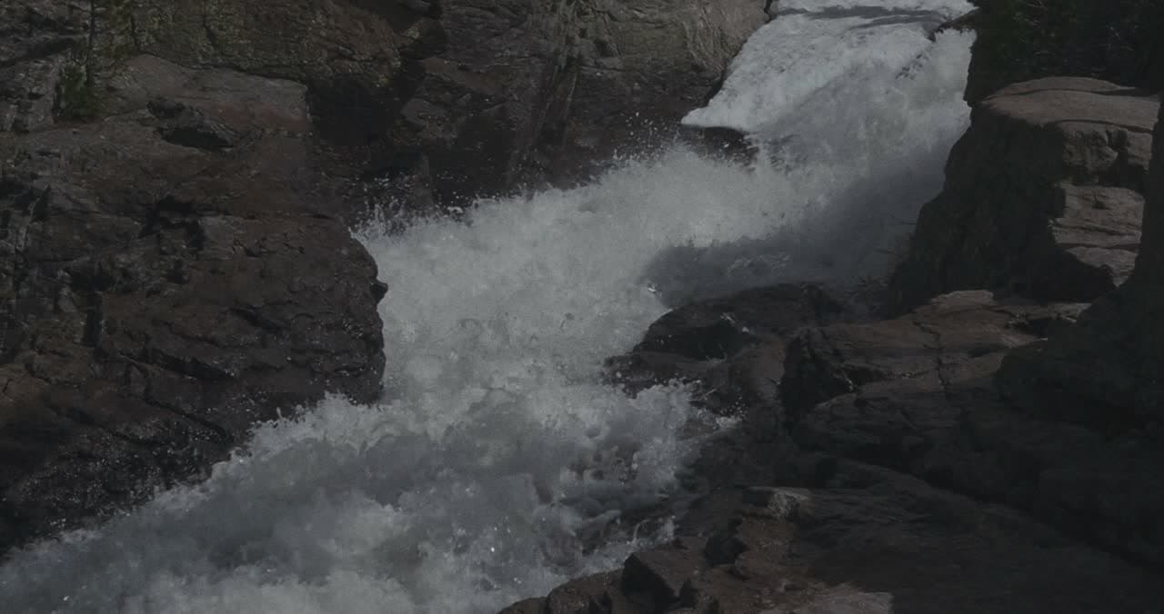 Whitewater rushing through a rocky gorge